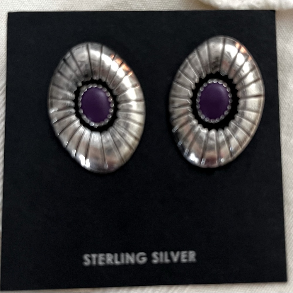 Native American silver and purple post earrings.